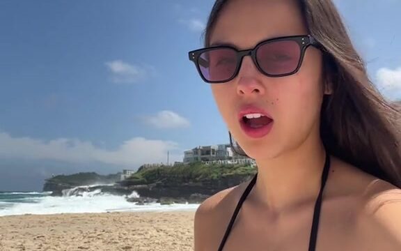 Olivia Rodrigo shows off her big boobs naked on the beach!!!